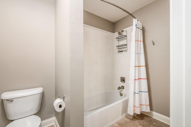 bathroom with shower / tub combo with curtain, toilet, and tile patterned flooring