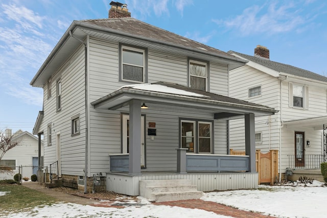 front of property featuring a porch