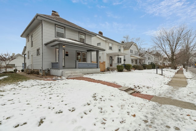 view of property with covered porch