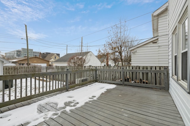 view of snow covered deck