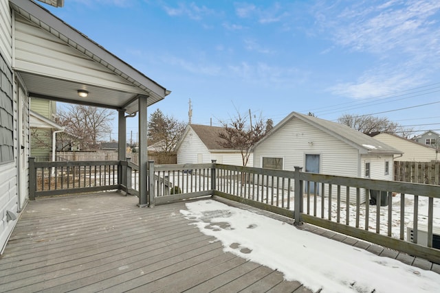 view of snow covered deck