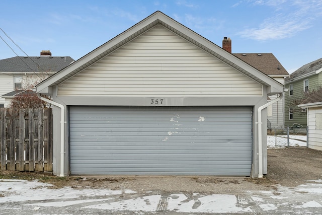 view of snow covered garage