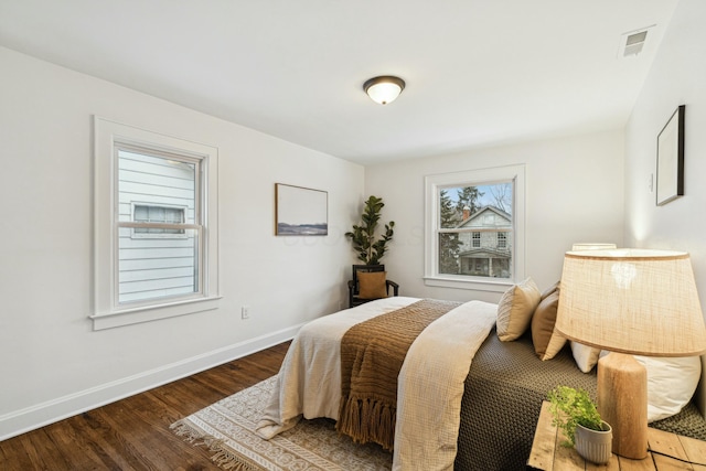 bedroom featuring dark hardwood / wood-style floors