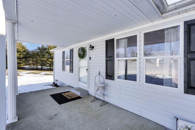 view of snow covered patio