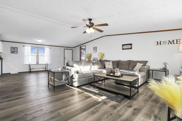 living room with crown molding, vaulted ceiling, a textured ceiling, dark hardwood / wood-style floors, and ceiling fan