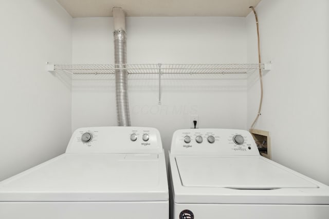 laundry room featuring independent washer and dryer