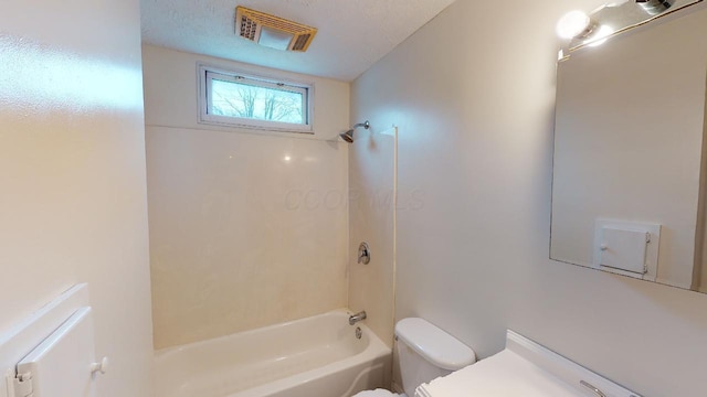 full bathroom featuring shower / washtub combination, vanity, and toilet