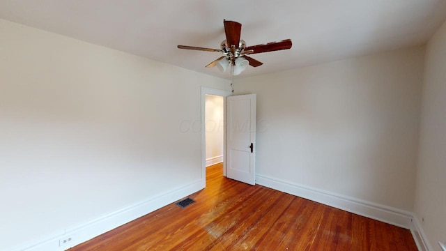 unfurnished room featuring ceiling fan and light wood-type flooring