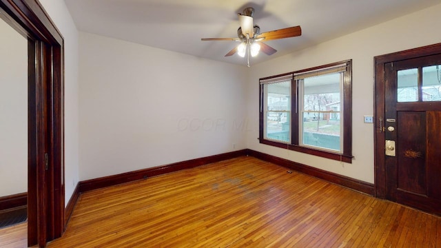 entrance foyer with ceiling fan and light hardwood / wood-style flooring