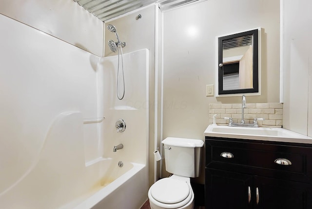 full bathroom featuring toilet, tasteful backsplash, shower / bath combination with curtain, and vanity