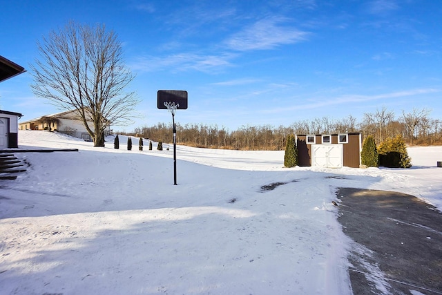 view of yard covered in snow