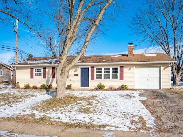 single story home with a garage