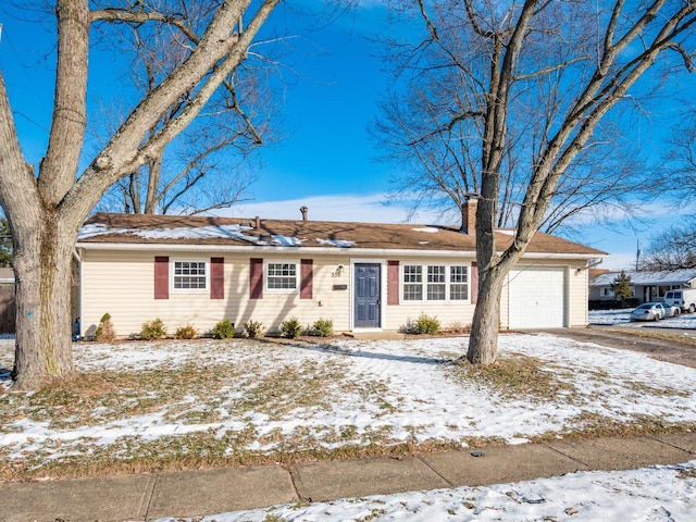 single story home with a garage