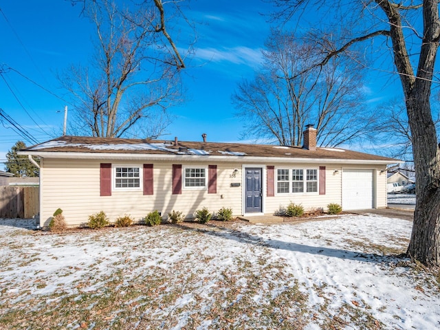 single story home with a garage