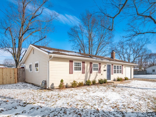 single story home with a garage