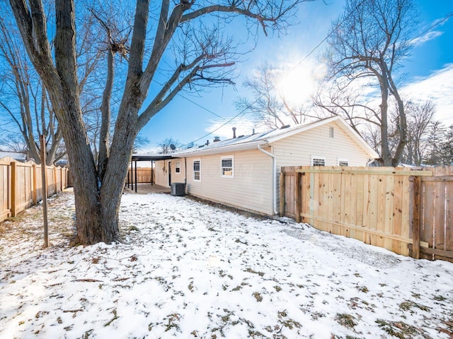 view of snow covered house