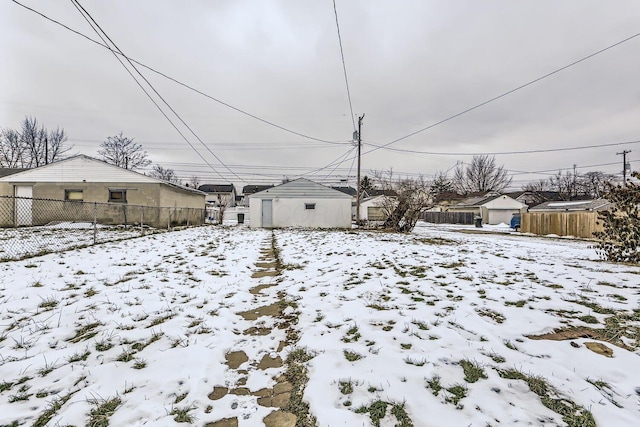 view of yard covered in snow