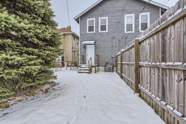 view of snow covered property