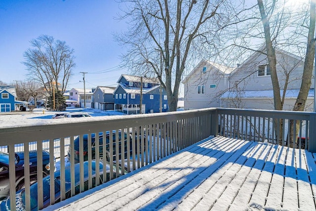 view of snow covered deck