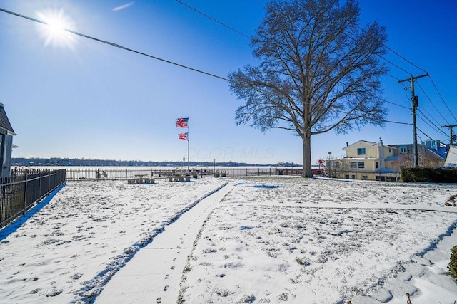 view of yard layered in snow