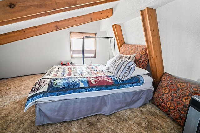 bedroom featuring lofted ceiling and carpet floors