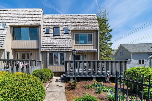 view of front of property featuring a deck