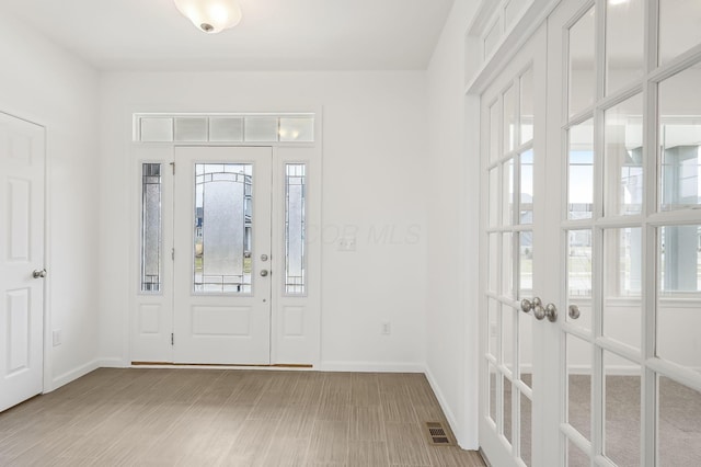 foyer featuring light hardwood / wood-style flooring