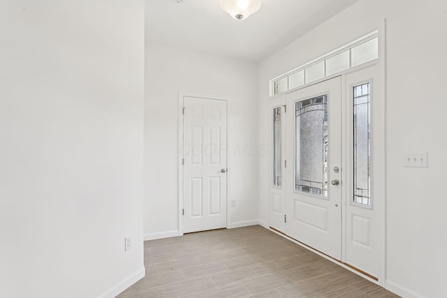 entrance foyer featuring light hardwood / wood-style flooring