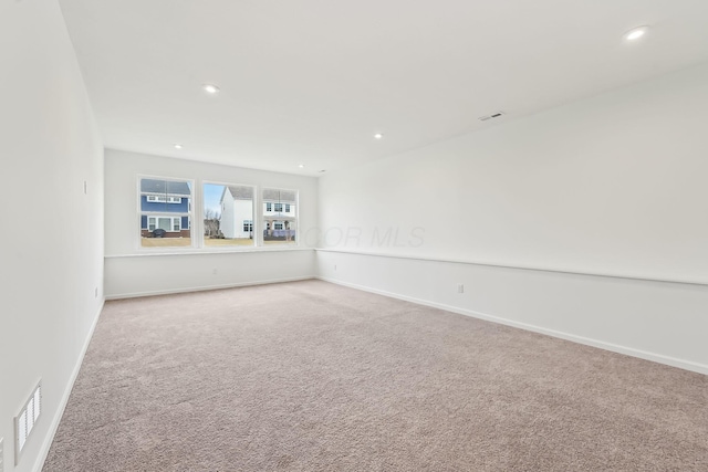 view of carpeted spare room