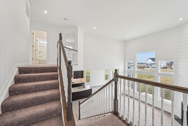 stairway with a wealth of natural light