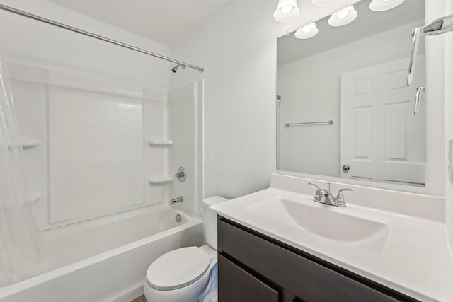 full bathroom featuring vanity, shower / tub combo, and toilet