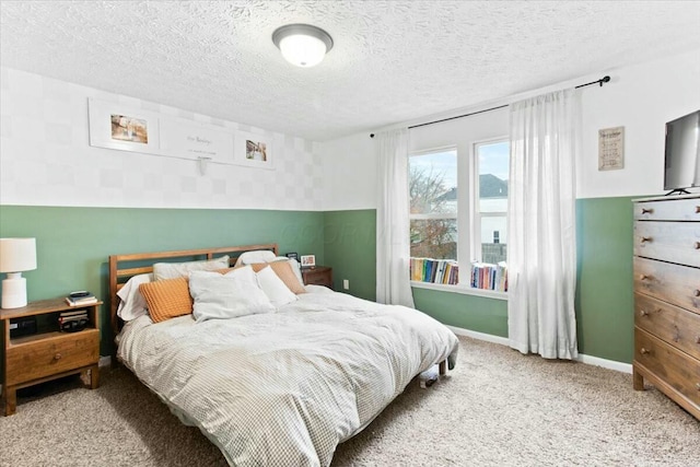 carpeted bedroom with a textured ceiling