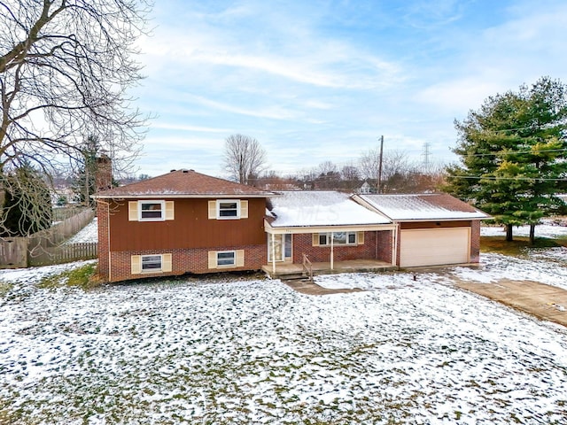 view of front of home with a garage