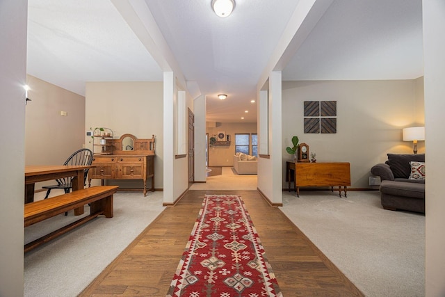 corridor featuring hardwood / wood-style floors