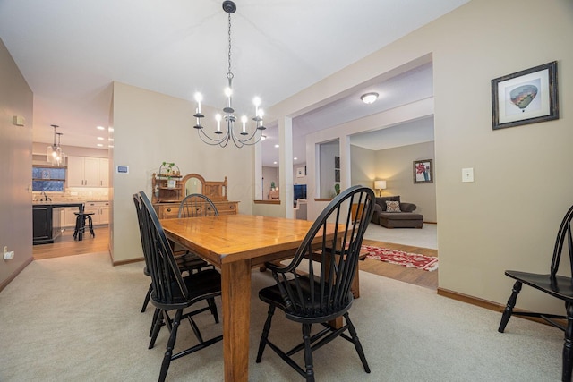 view of carpeted dining space