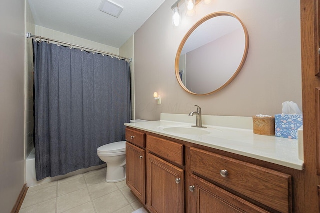 full bathroom with vanity, a textured ceiling, toilet, and shower / bath combo with shower curtain