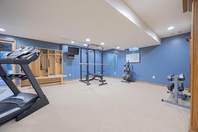 exercise room featuring carpet