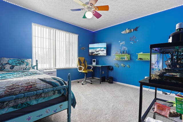 carpeted bedroom with multiple windows, ceiling fan, and a textured ceiling