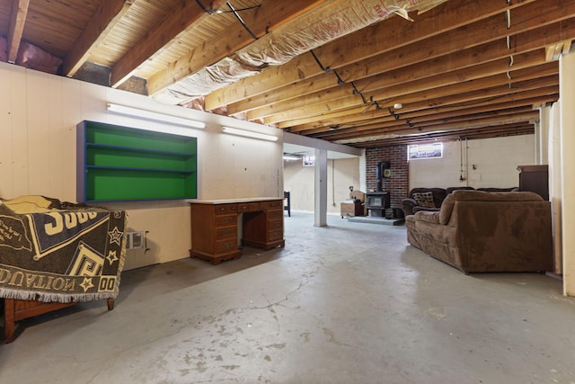 basement featuring a wood stove