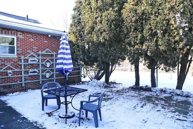 view of yard covered in snow