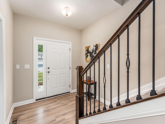 entryway featuring light hardwood / wood-style floors