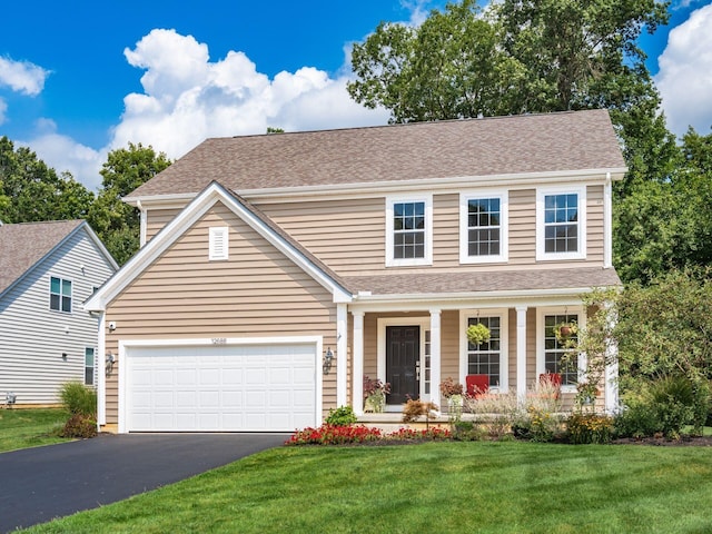 view of front of property featuring covered porch and a front lawn