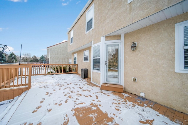 view of snow covered deck