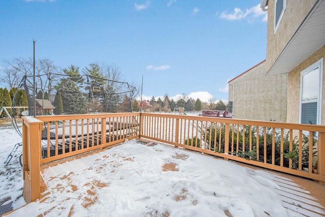 view of snow covered deck