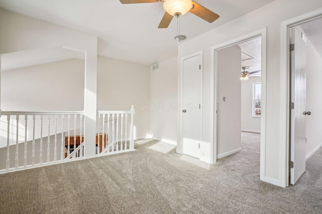 unfurnished room featuring carpet