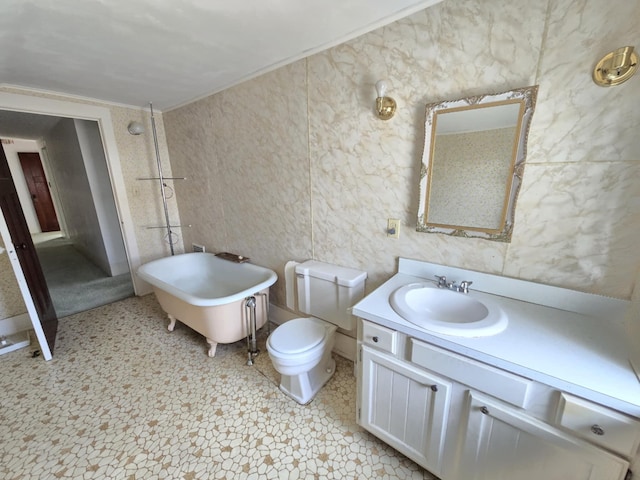 215 S Jefferson St, Galion, OH 44833 - full bathroom featuring a soaking tub, toilet, and vanity