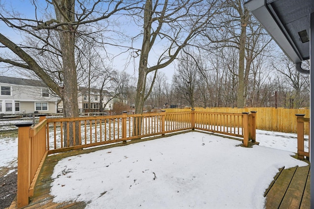 view of snow covered deck