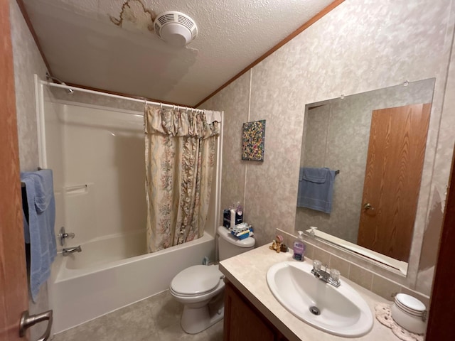 full bathroom featuring crown molding, shower / bath combo, vanity, a textured ceiling, and toilet