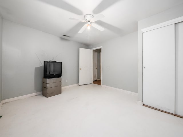 unfurnished bedroom with a closet and ceiling fan