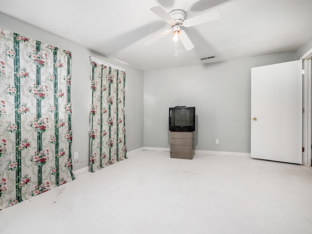 interior space featuring ceiling fan